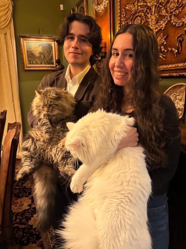 Family members with their cats
